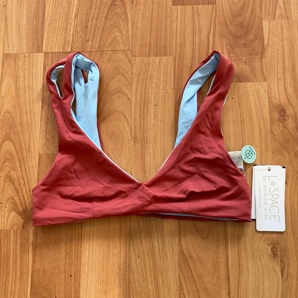 NWT L*space reversible one wave top